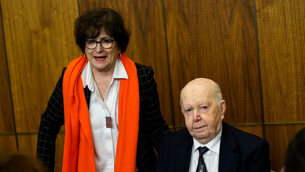Debora Lyon, the left, former former envoy to preserve the Holocaust memory and combat anti -Semitism, speaks with David Moskovic, a surcrse and the survivor Ashfitz, before occurring in the celebration of the eighty anniversary of the liberation of Auschwitz, in Proctinkary Procind, on Friday, January.