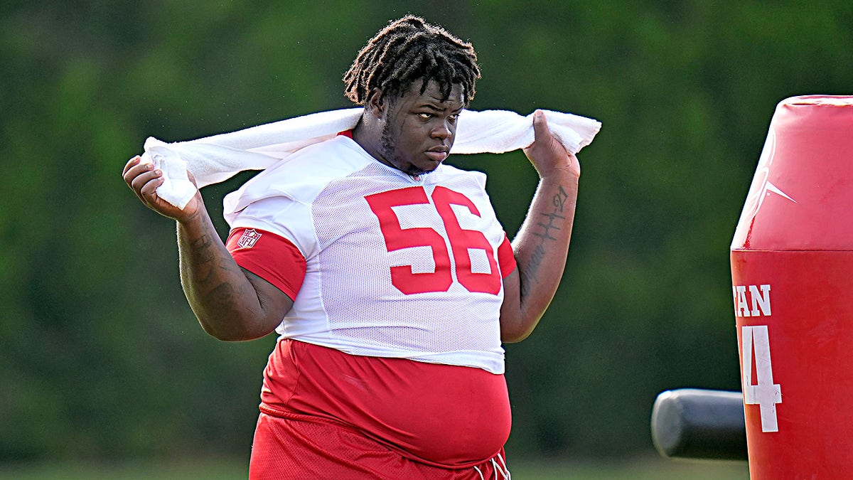 Desmond Watson looks on
