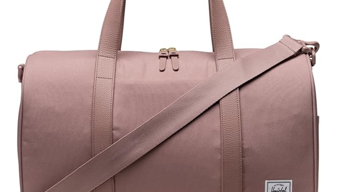 This stylish container has a abstracted footwear compartment.