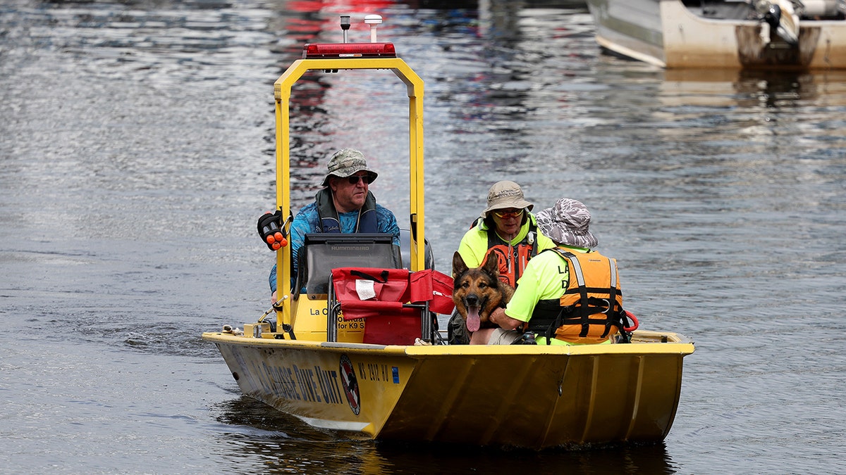 Search and rescue teams look for the body of missing persons Eliotte Heinz.