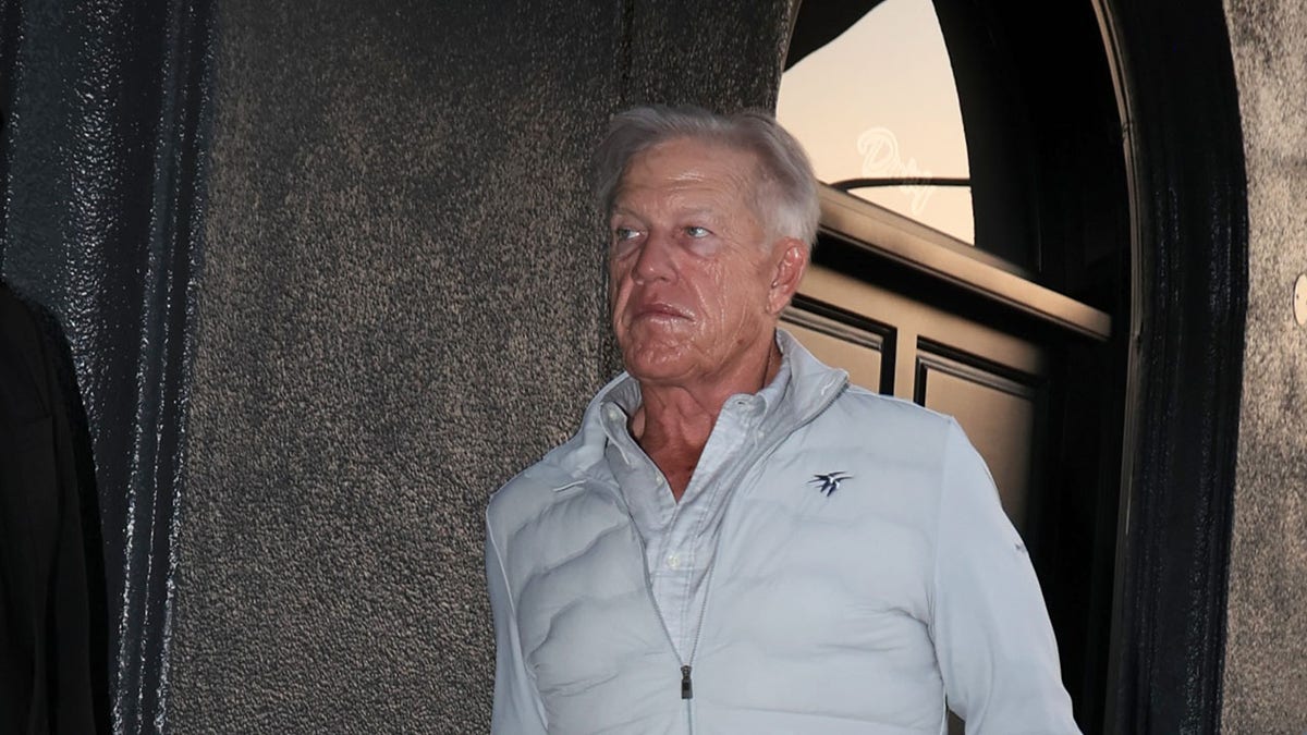 John Elway walking