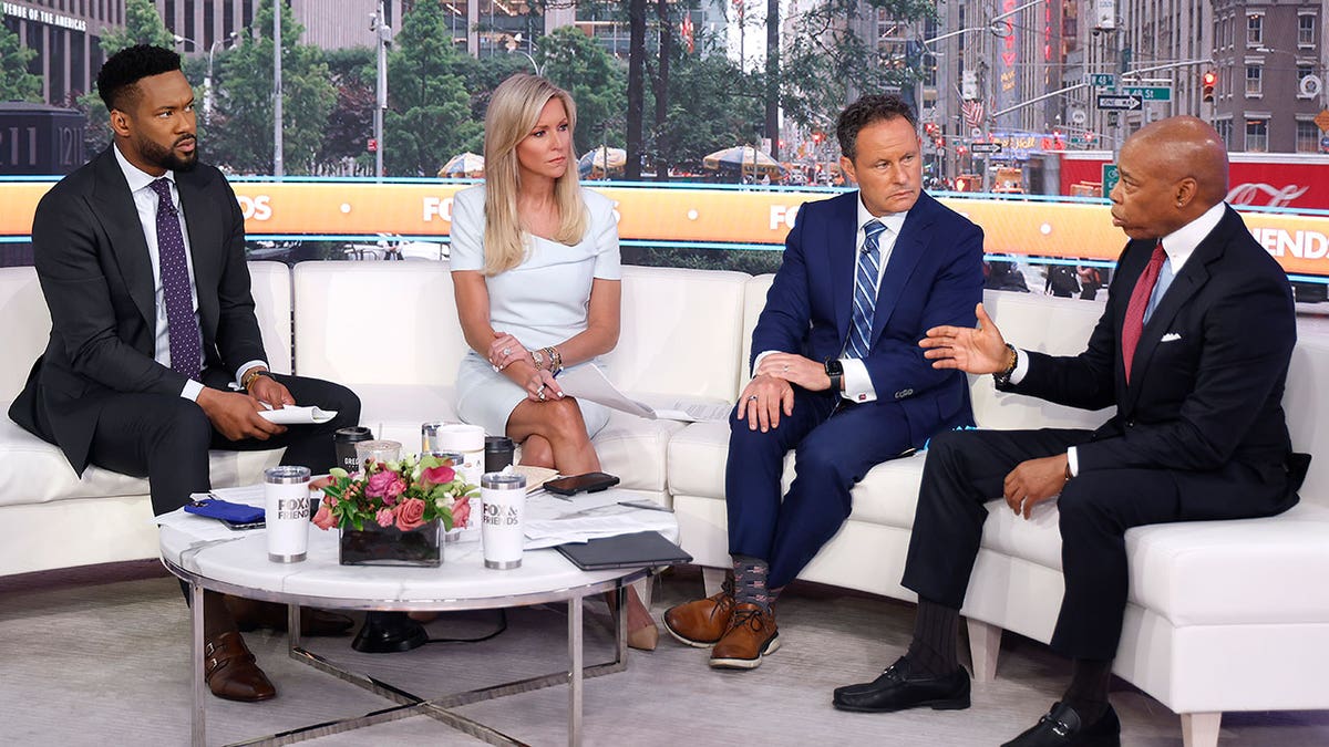  New York City Mayor Eric Adams joins Fox anchors Lawrence Jones, Ainsley Earhardt and Brian Kilmieade during "Fox & Friends" at Fox News Channel Studios on June 16, 2025 in New York City. 