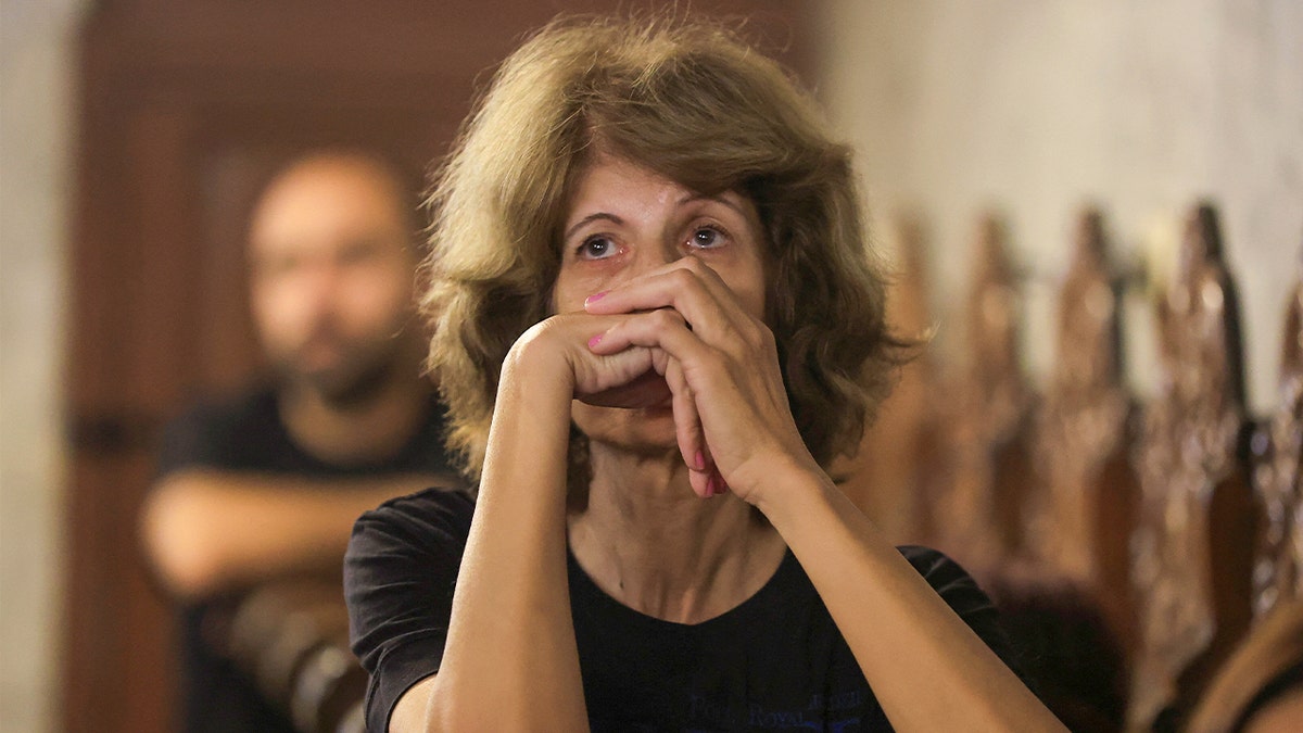 Mourners attend funeral for Palestinian Christians killed in Gaza in apparent Israeli strike