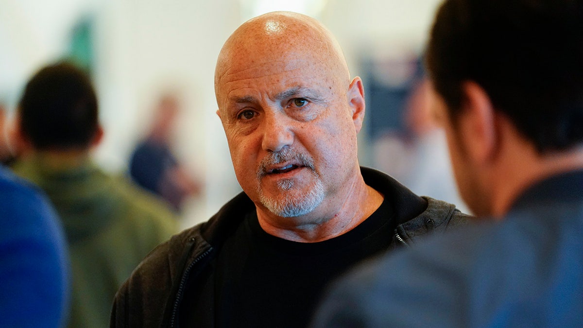 Mike Rizzo answers questions from the media