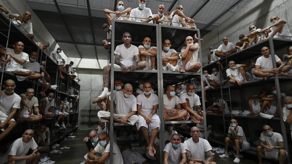 Inmates remain in a cell at the Counter-Terrorism Confinement Centre (CECOT) mega-prison, where hundreds of members of the MS-13 and 18 Street gangs are being held, in Tecoluca, El Salvador on January 27, 2025. (Photo by Marvin RECINOS / AFP)
