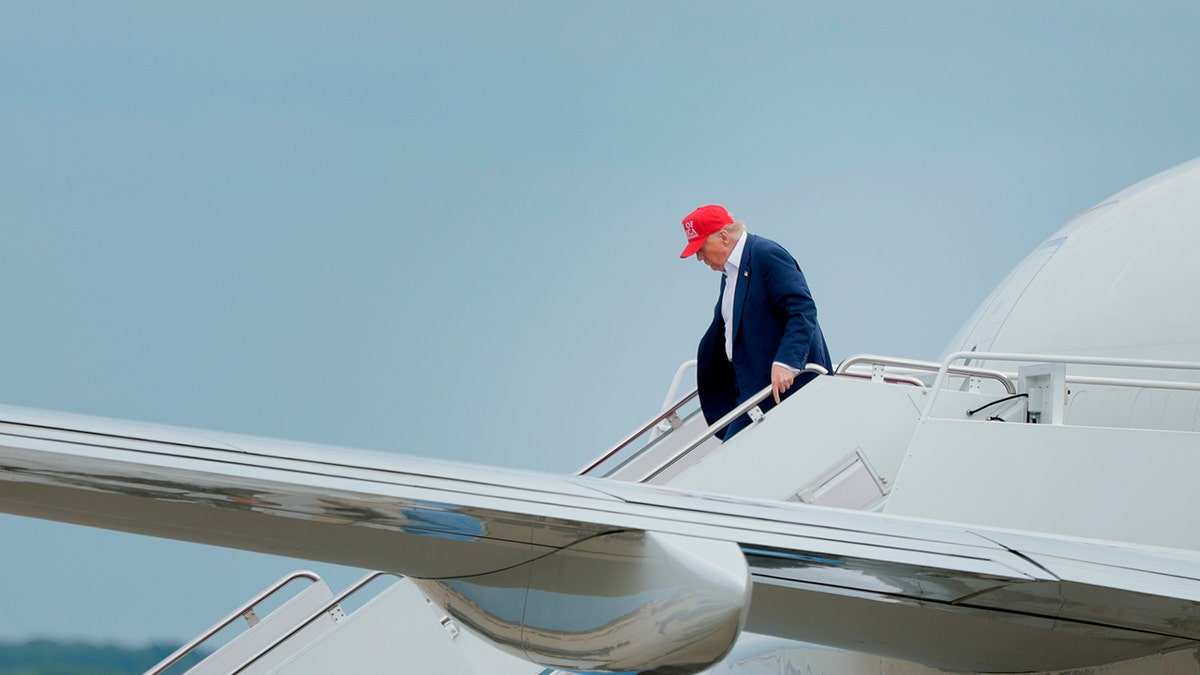 President Donald Trump deplanes AF1