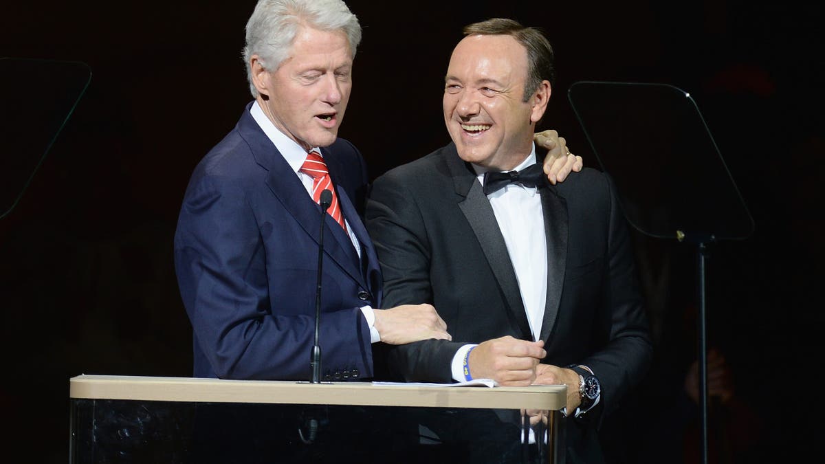 bill clinton with his arm around kevin spacey