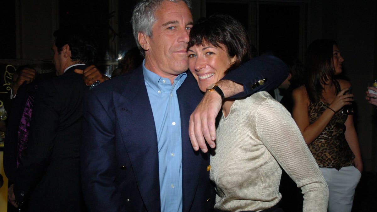 jeffrey epstein holding ghislaine maxwell