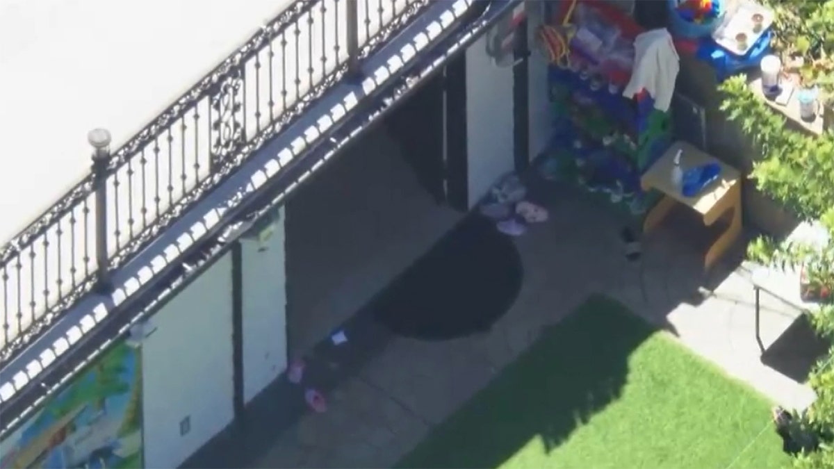Children's property can be seen at the crime scene.