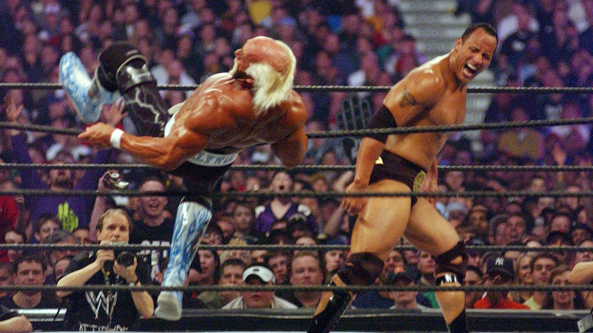 Hulk Hogan and The Rock wrestle
