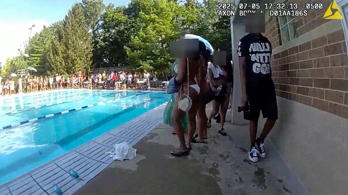 Body camera footage shows a teenage flash mob at an Illinois pool