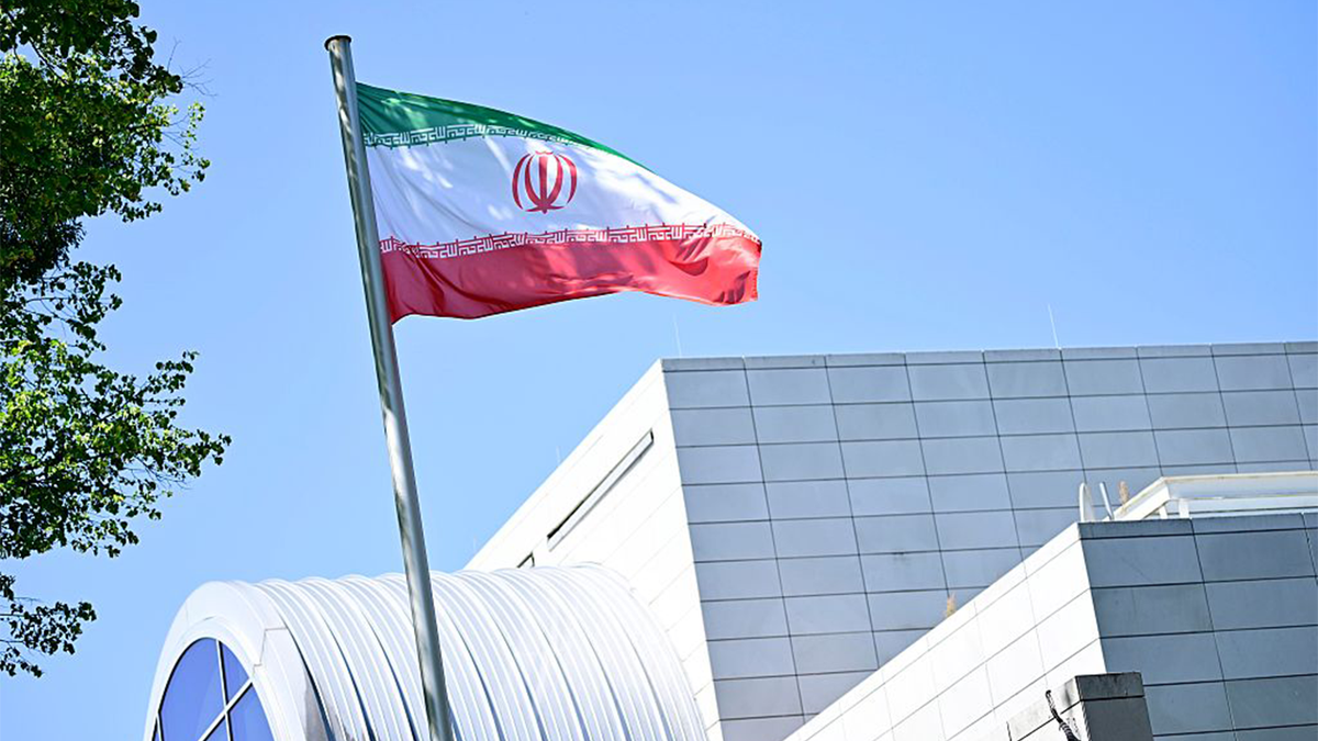 The Iran flag flies in front of the Iranian Embassy in Berlin.