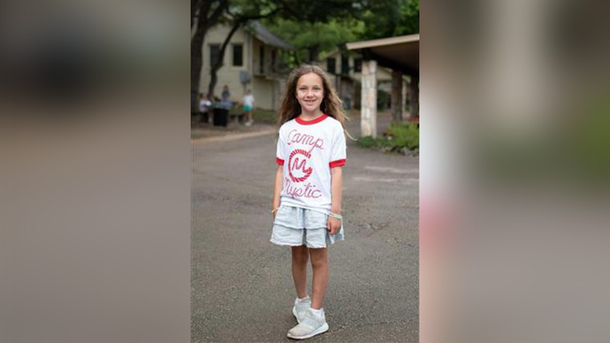 Janie Hunt in a Camp Mystic shirt