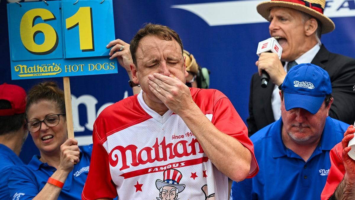Joey Chestnut eats hot dogs