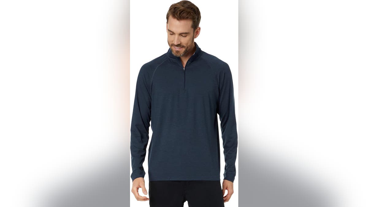 This quarter zip delivers light insulation and breathability in a unique and stylish print.