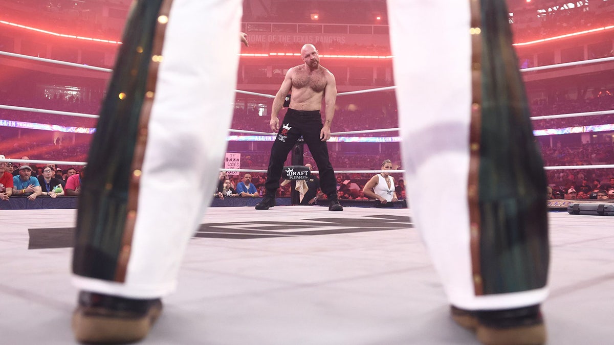 Jon Moxley stares down Adam Page