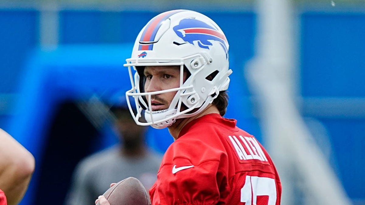 Josh Allen looks to pass