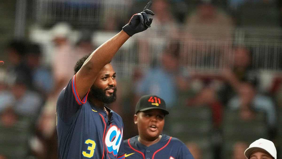 Junior Caminero celebrates