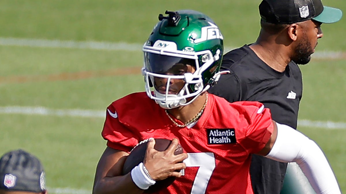 Justin Fields runs