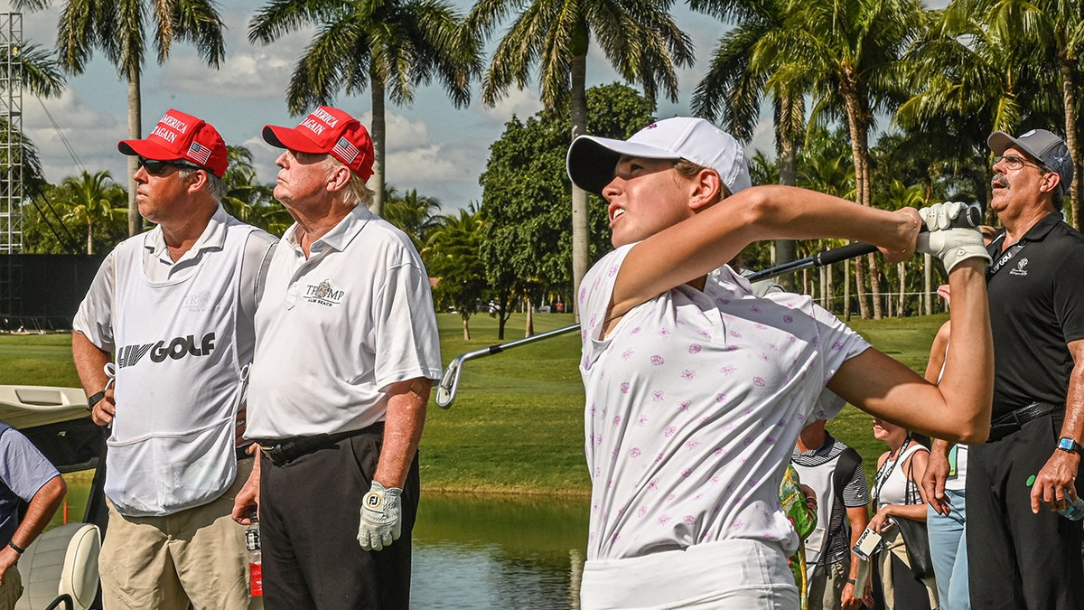 Kai Trump swings play club