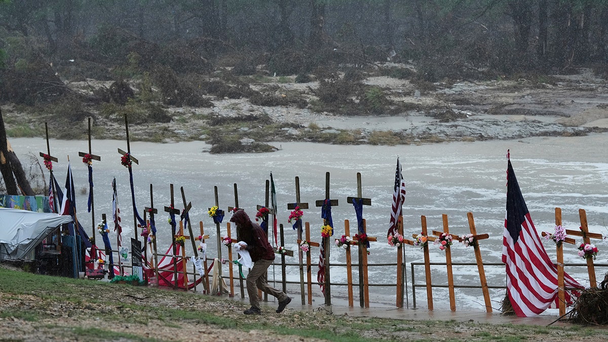 makeshift memorial for flood victims