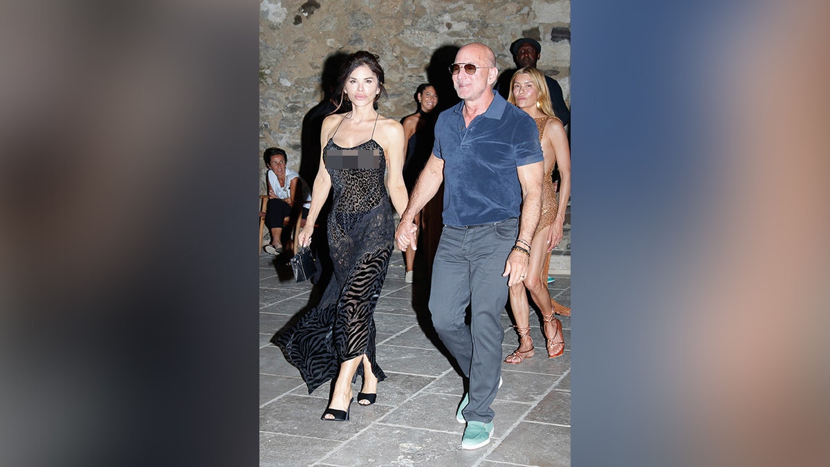 Jeff Bezos and Lauren Sanchez holding hands in Saint-Tropez.
