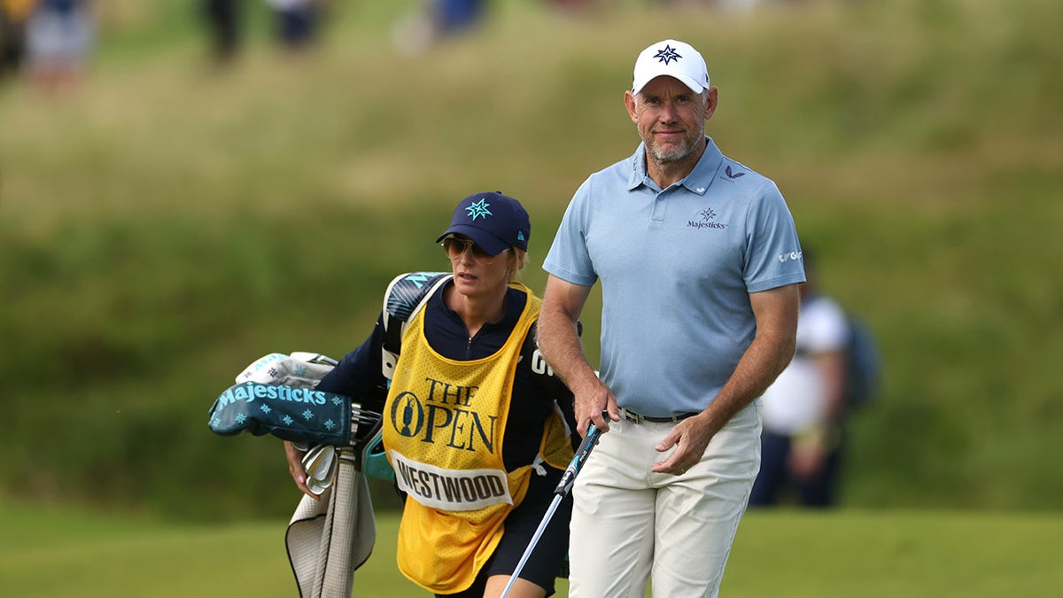 Lee Westwood walks on golf course