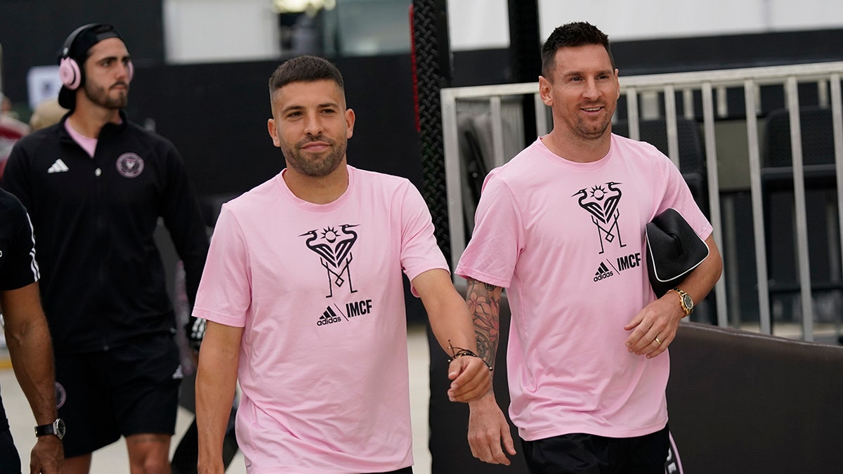 Lionel Messi and Jordi Alba