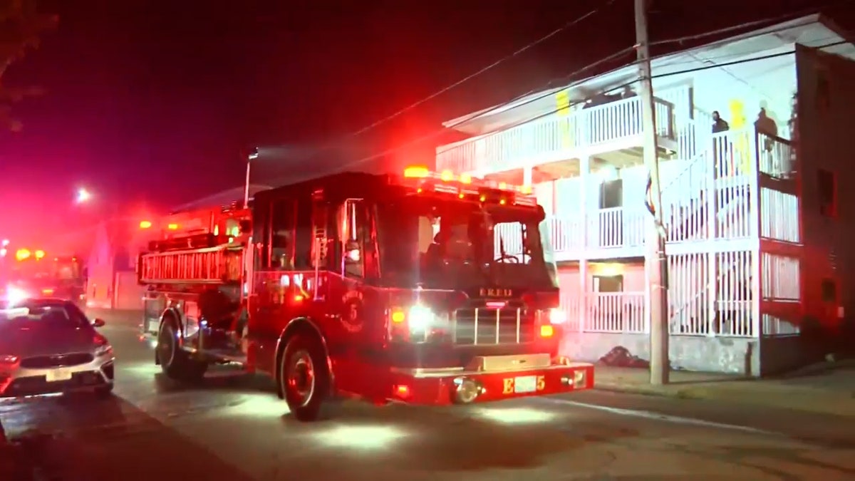 Fire truck outside of multi-level building