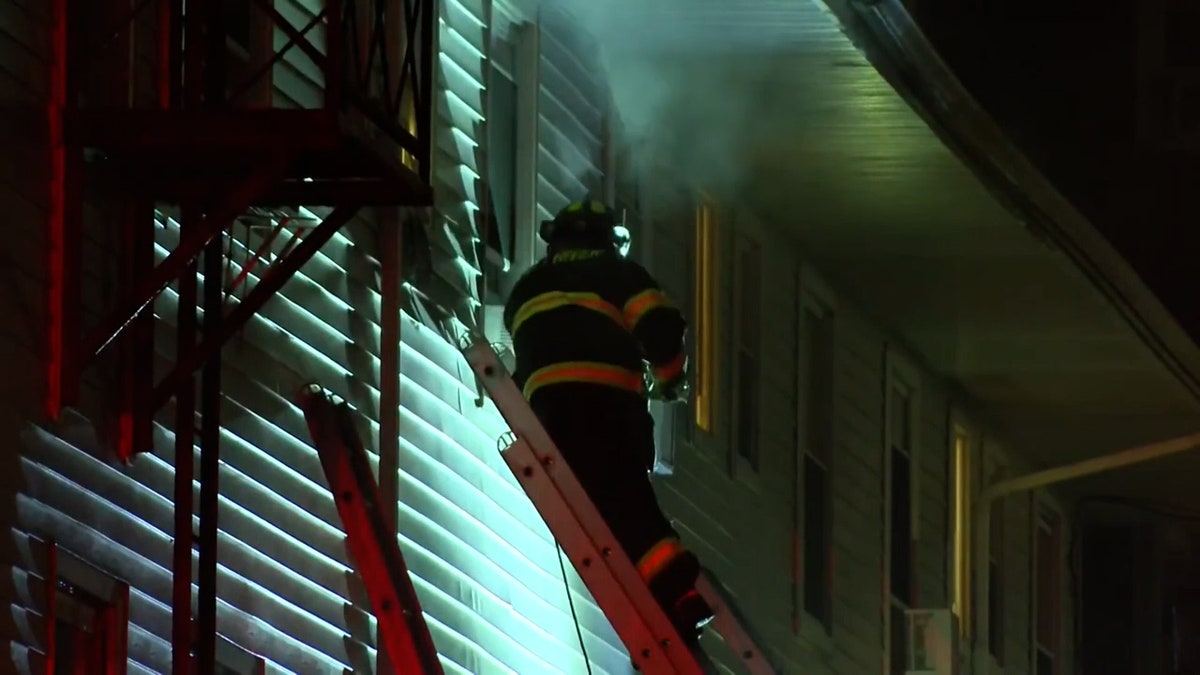 The firefighter raised the ladder to the window