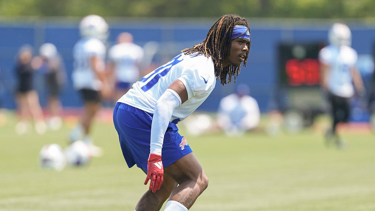 Maxwell Hairston does drills on field