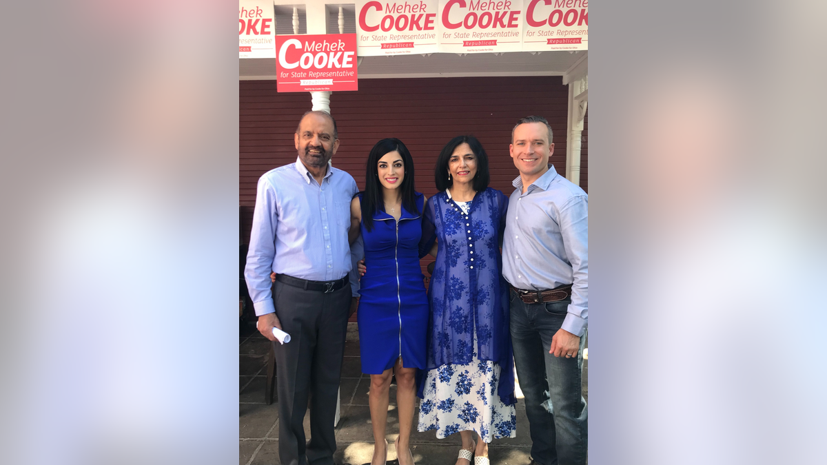 father Jagdeep Singh, mother Sunita Singh and husband Michael Cooke.