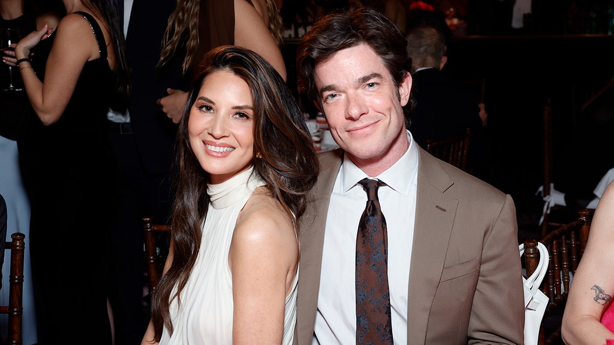Olivia Munn and John Mulaney attend "An Unforgettable Evening" Benefiting the Women's Cancer Research Fund at The Beverly Hilton on April 28, 2025 in Beverly Hills, California.