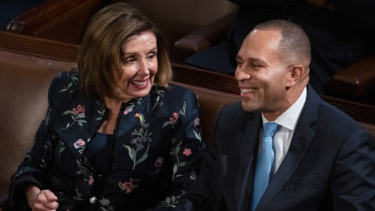 Rep. Nancy Pelosi speaks with House Minority Leader Rep. Hakeem Jeffries