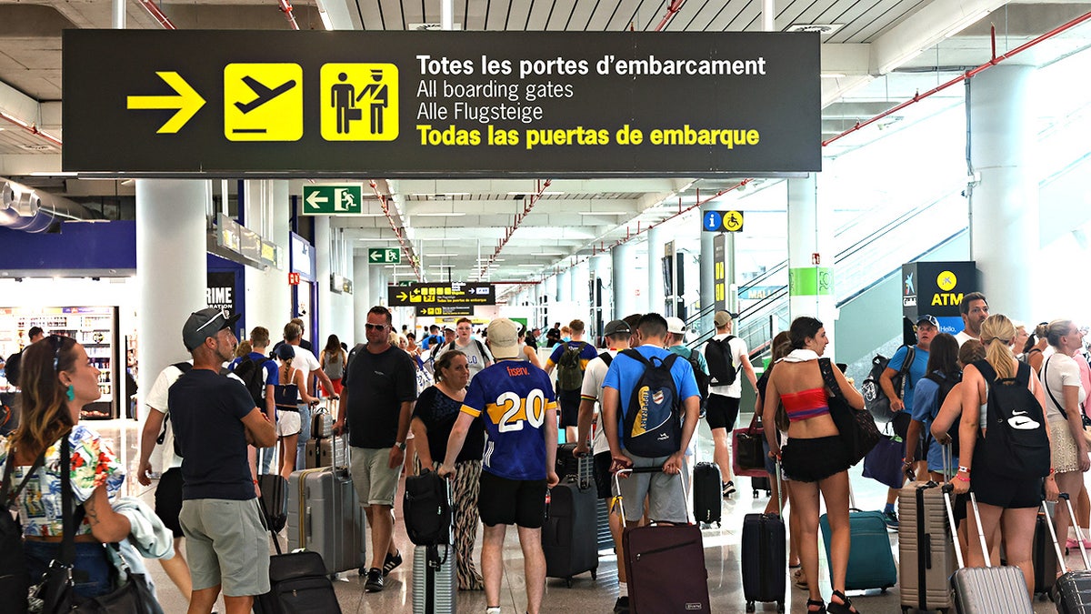 Travelers at Palma de Mallorca Airport in Palma, Spain, on Wednesday, July 23, 2025: New travel collection