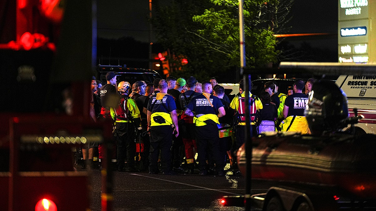 Emergency response equipment gathered on the street