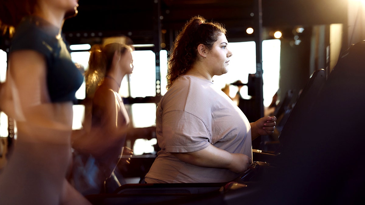 Younger heavier woman exercising