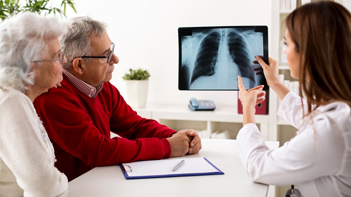 Older couple chest X-ray