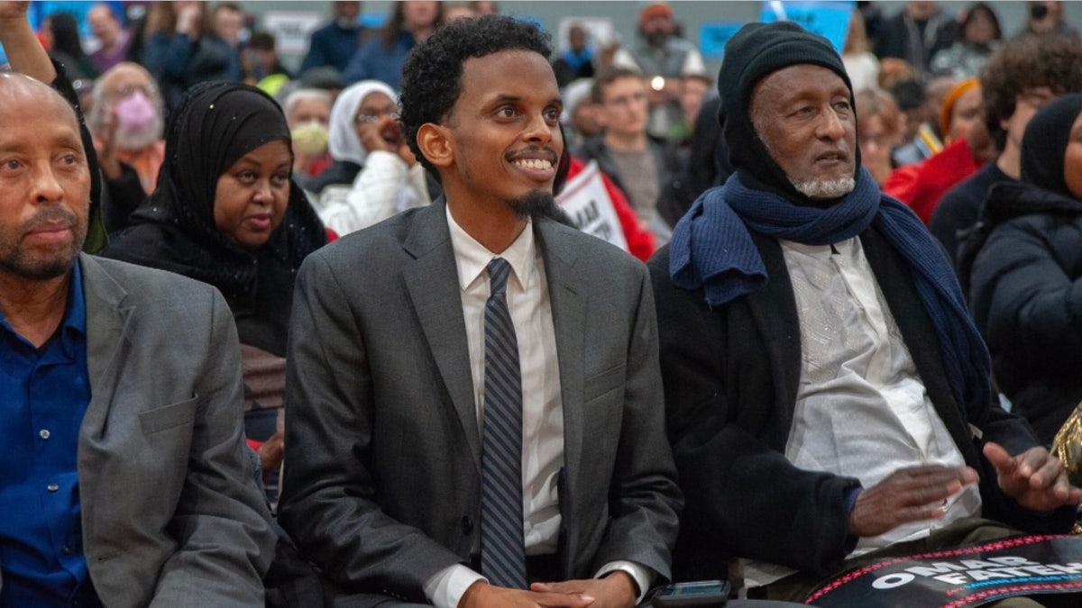 Democratic socialist Minnesota state Sen. Omar Fateh (center), who is running for mayor of Minneapolis, as been compared to New York City's Zohran Mamdani.
