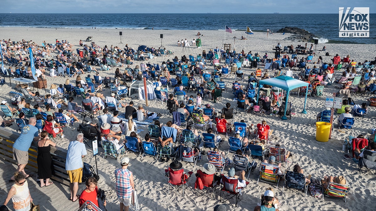 Catholic parishioners at Mass on the beach