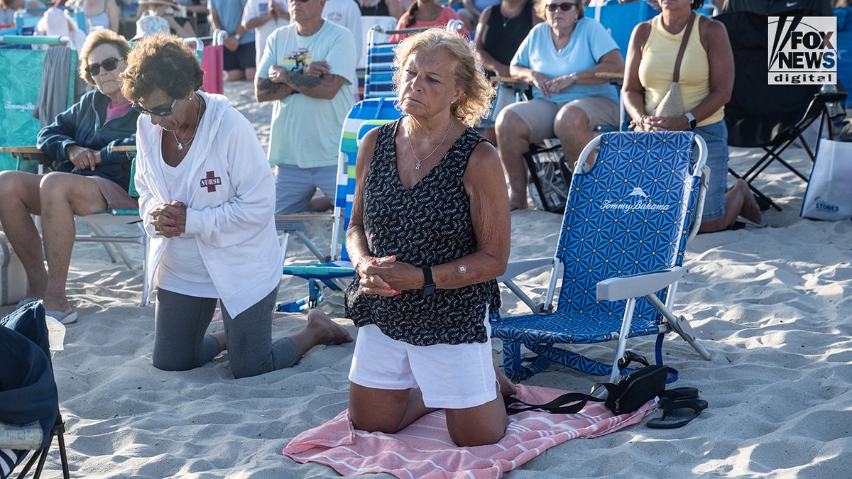 Catholic parishioners at Mass on the beach