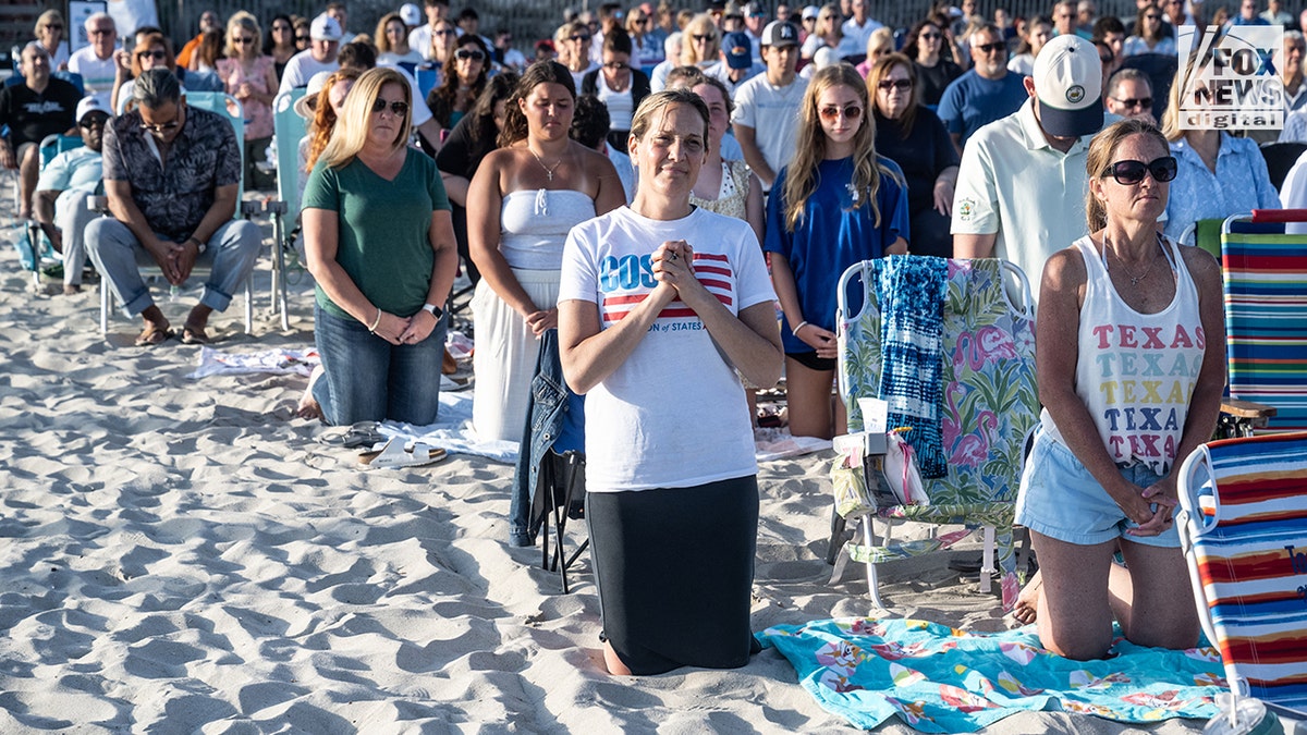 Catholic parishioners at Mass on the beach