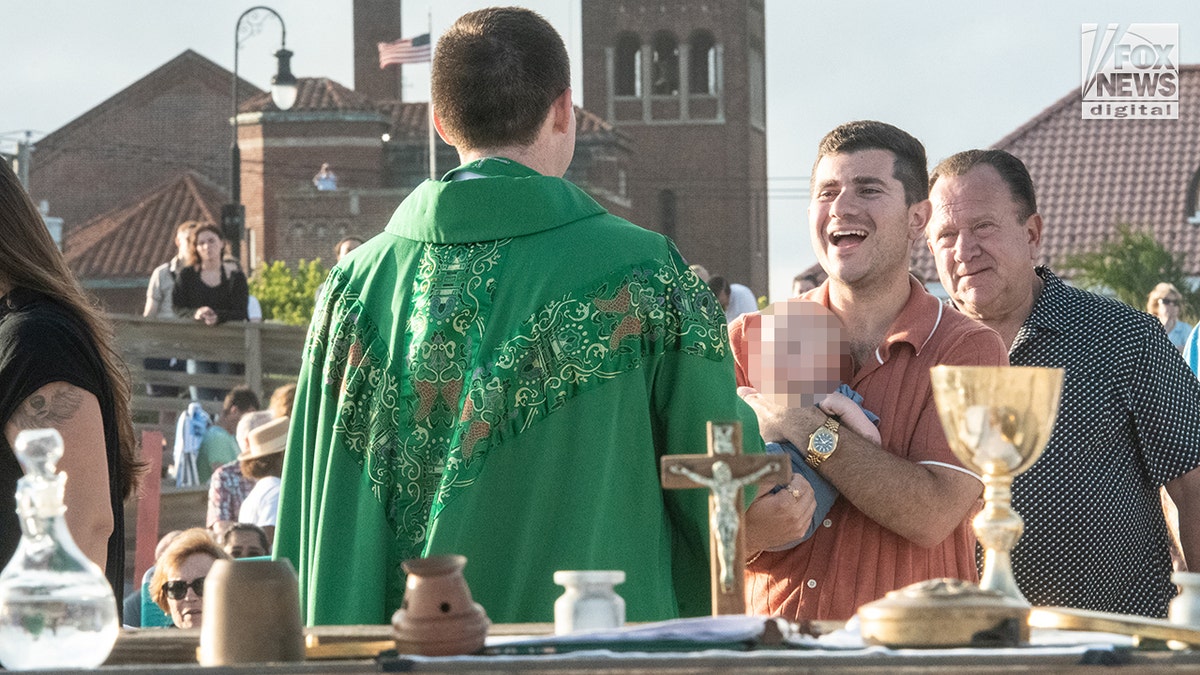 Catholic parishioners at Mass on the beach