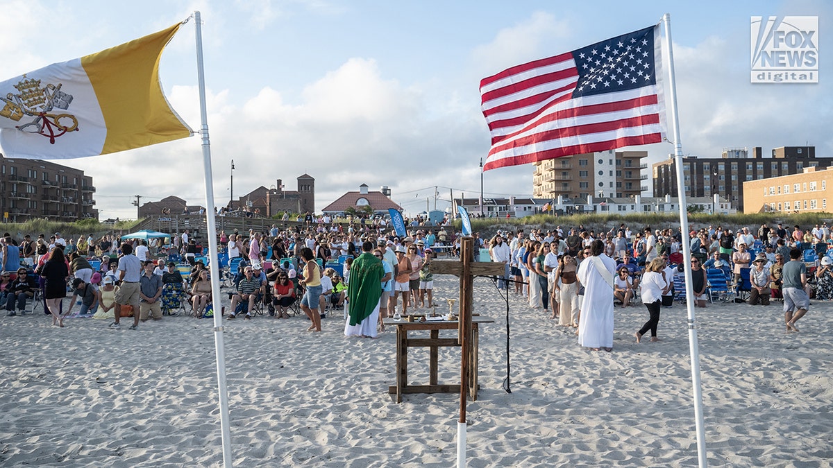 Catholic parishioners at Mass on the beach