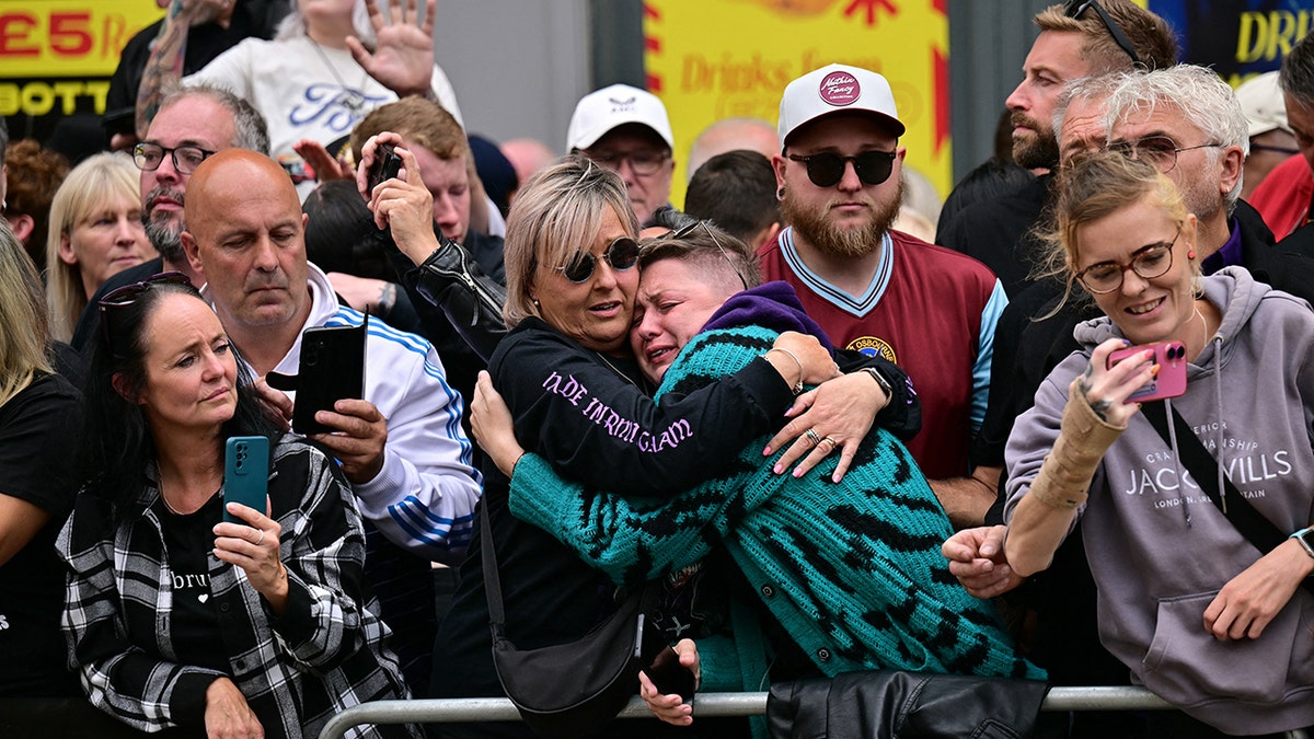 Fans at the funeral for Ozzy Osbourne.