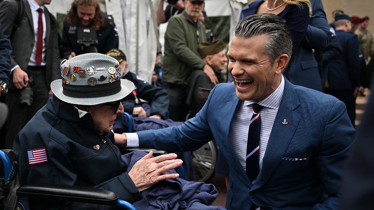 Hegseth greets Jake Larson in France on the 81st anniversary of D-Day