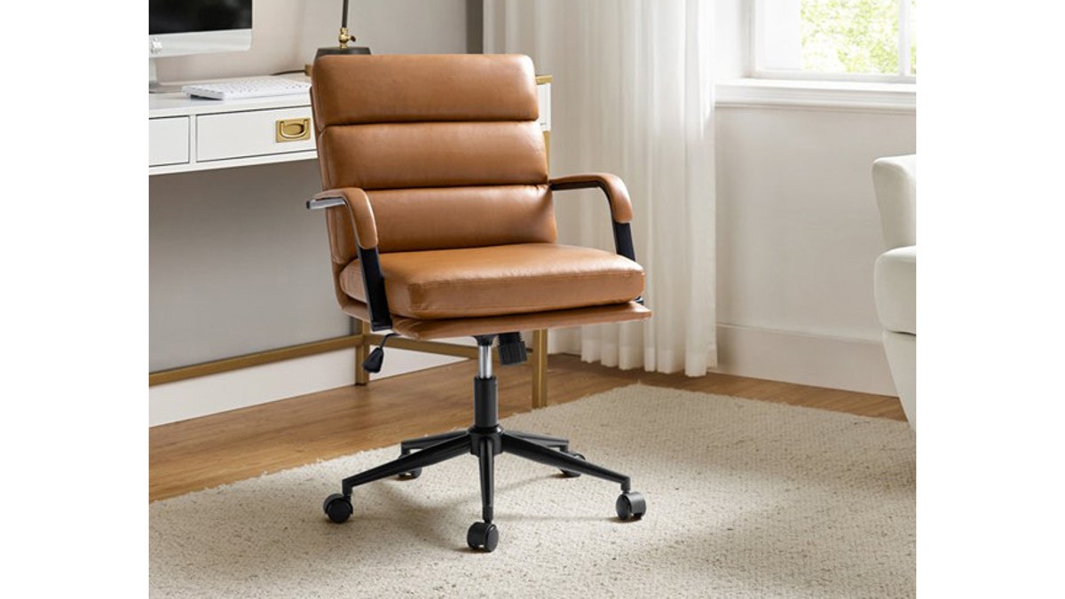 Add some class to your dorm room with a faux leather chair.