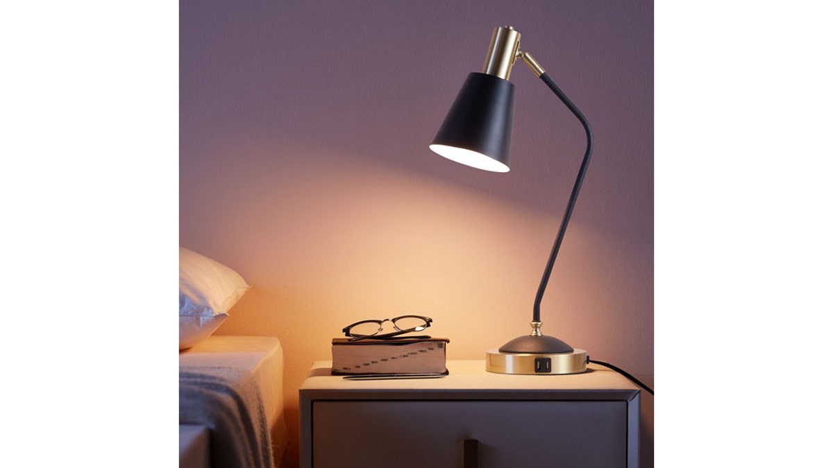 Use the USBs on this lamp to charge your phone.