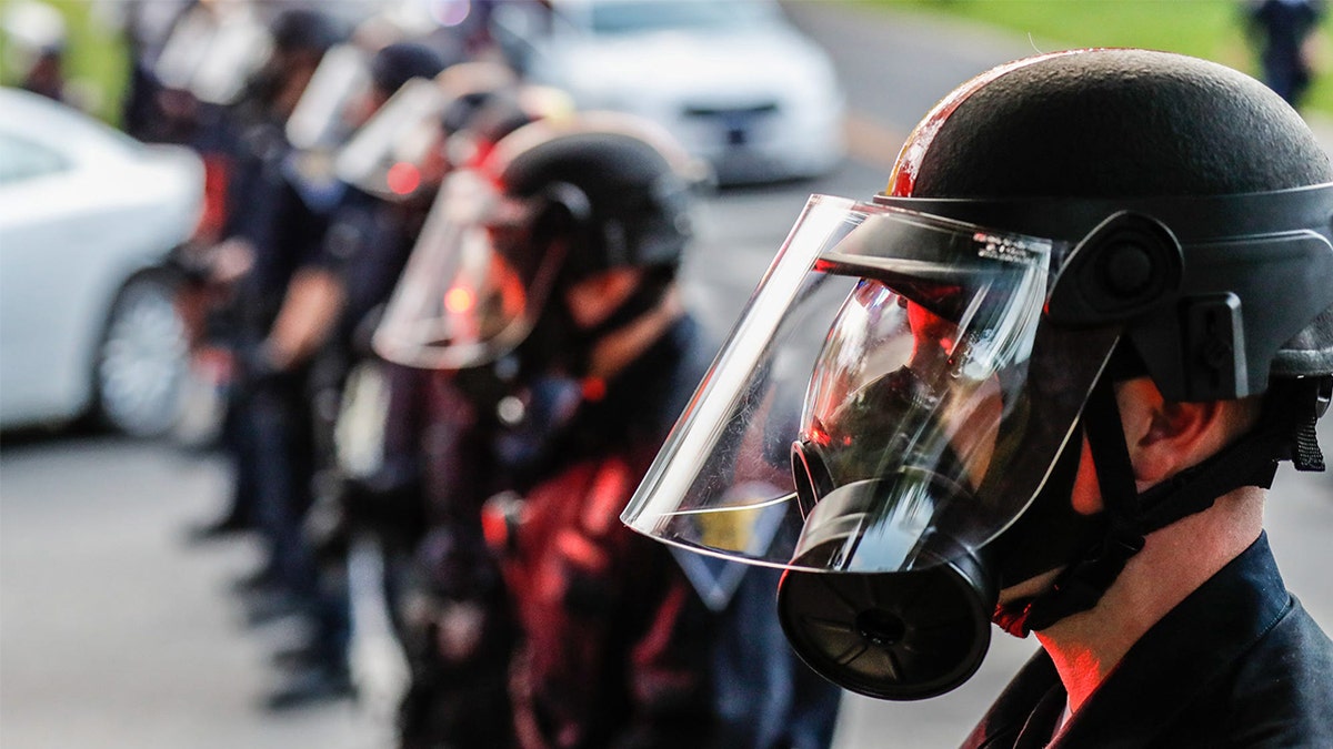 Police officers in riot gear