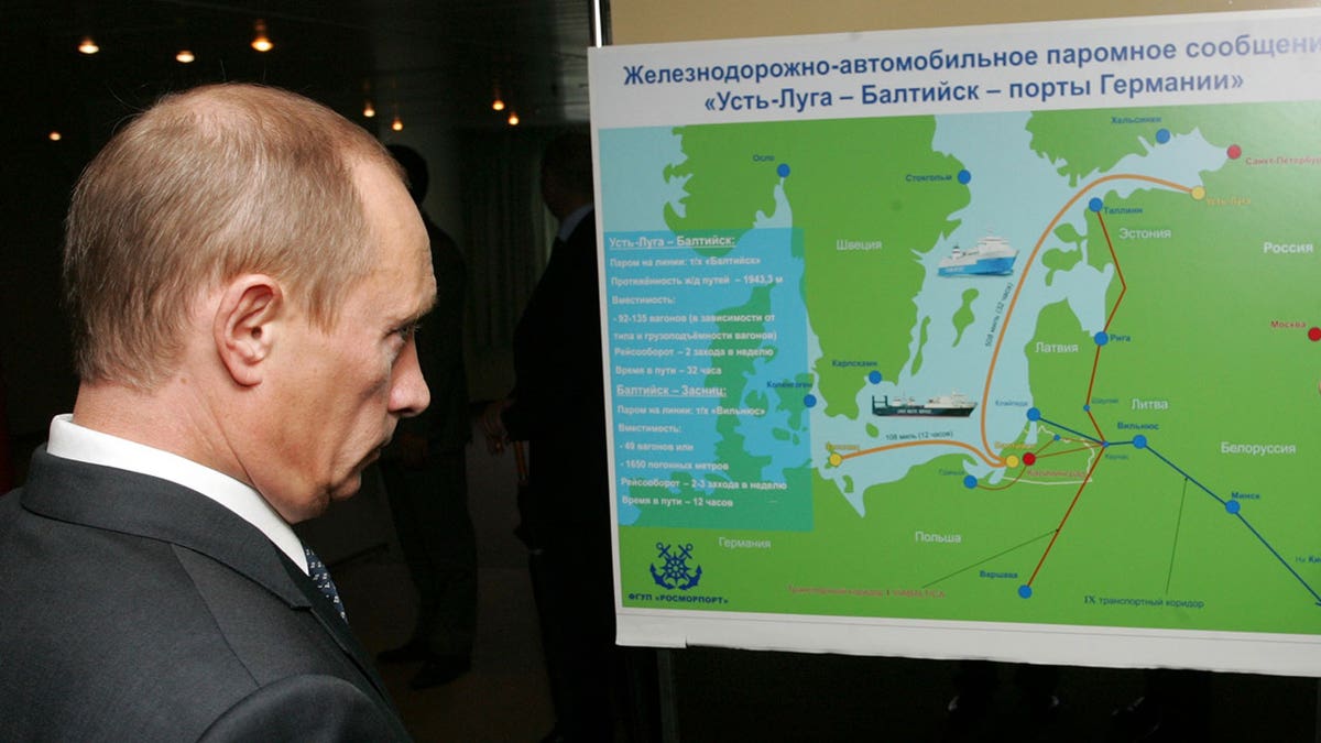 Putin looks at Kaliningrad's card.